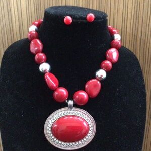 Large red and silver pendant necklace with earrings. Great shape.